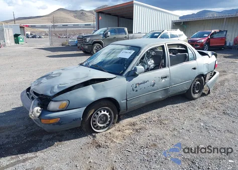 1996 Toyota Corolla Dx z USA, uszkodzony, nr VIN 1NXBB02E4TZ396521